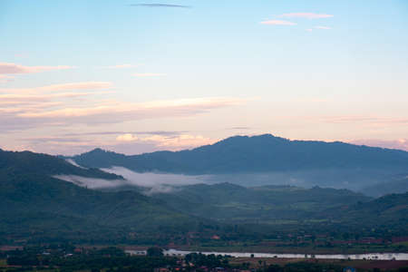 Landscape with clouds,sky and  mountains of northern Thailand.The mountain splits between Chiang Khong and Chiang Saen districtsの写真素材