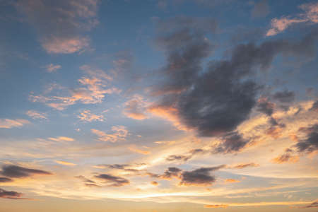 Colorful sunset and sunrise with clouds.Blue and orange color of nature.Many white clouds in the...