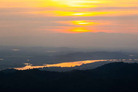 Aerial view of endless lush pastures of CHIANGRAI. landscape on sunset.The sun's reflection on the river.の写真素材