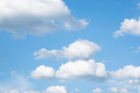 Many small clouds in blue sky.Summer cloudy.White clouds floating in the skの写真素材