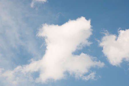 Many small clouds in blue sky.Summer cloudy.White clouds floating in the skの写真素材