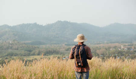 Freedom traveler man standing.A man carrying a bag.People and copy spaceの写真素材