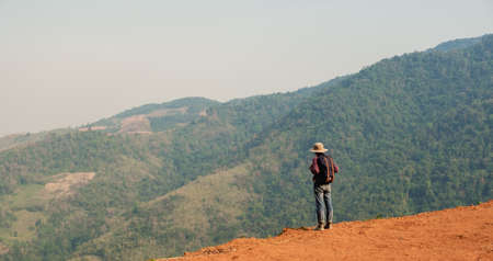 Freedom traveler man standing.A man carrying a bag.People and copy spaceの写真素材