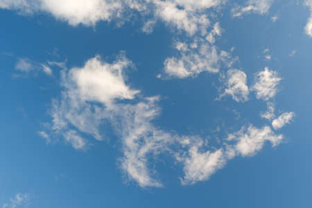 Many small clouds in blue sky.Summer cloudy.White clouds floating in the sky.の写真素材