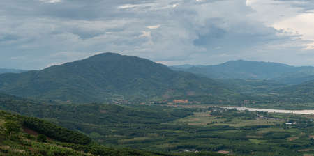 Landscape with clouds,sky and  mountains of northern Thailand.The mountain splits between Chiang Khong and Chiang Saen districtsの写真素材