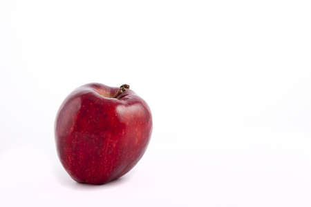 claret one apple on a white backgroundの写真素材