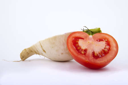 tomato and turnip on white backgroundの写真素材