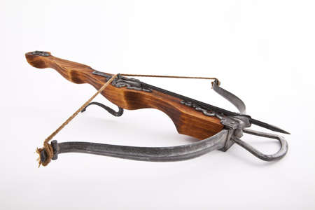 crossbow with an arrow on a white backgroundの写真素材