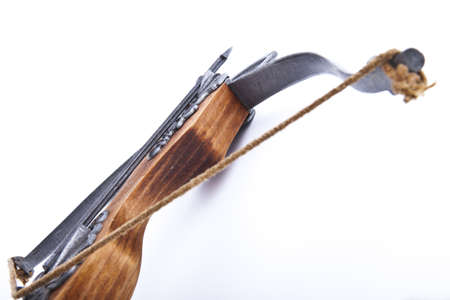 crossbow with an arrow on a white backgroundの写真素材