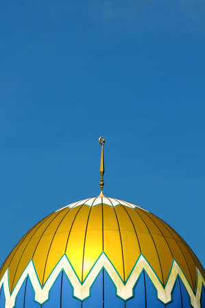 Beautiful muslim mosque dome isolated blue sky backgroundの写真素材