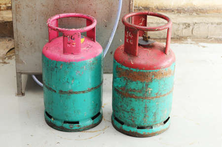 Dirty gas container isolated kitchen tableのeditorial素材