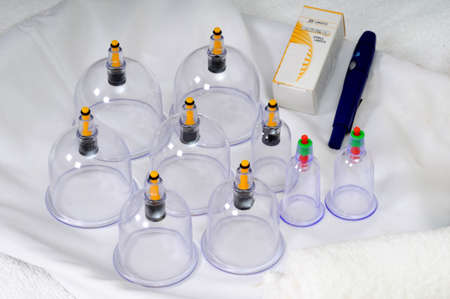 Medical cuipping therapy equipment isolated white backgroundのeditorial素材
