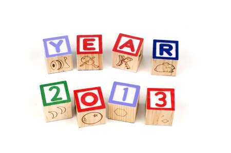 Alphabet blocks spelling Year 2013 isolated white background