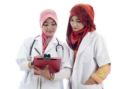 Young muslim lady doctor discuss isolated white backgroundの写真素材