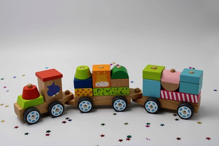 Wooden toy train with pieces to fit in fun colorsの写真素材