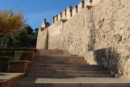 Inside of ancient castle with stairs and gardensのeditorial素材