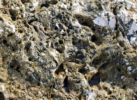 Mountain stone corroded by winds and waves on the coast of Spainの写真素材