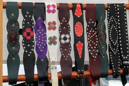 Leather belts for women with floral and leaf motifs in different shadesの写真素材