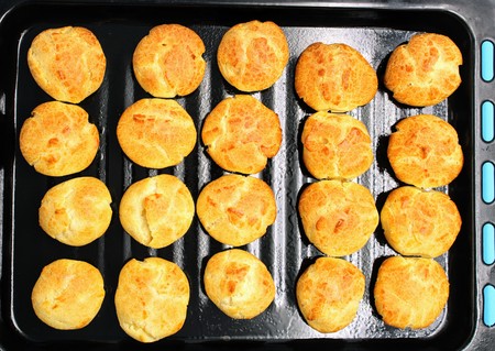 Round and appetizing home made baked profiteroles with a nice tan colorの写真素材