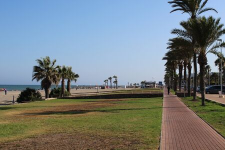 Promenade with lots of activities and leisure for tourists in the town of Roquetas de Mar of AlmerÃ­a in Spain on july 14, 2019のeditorial素材