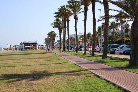 Promenade with lots of activities and leisure for tourists in the town of Roquetas de Mar of AlmerÃ­a in Spain on july 14, 2019のeditorial素材