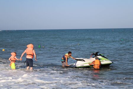 Place of leisure with hydrobicycles and water activities in the Urbanization of Roquetas de Mar of AlmerÃ­a in Spain on july 14, 2019のeditorial素材