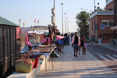 Promenade with lots of activities and leisure for tourists in the town of Roquetas de Mar of AlmerÃ­a in Spain on july 14, 2019のeditorial素材