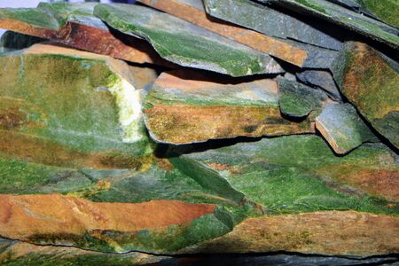 Image of backgrounds for graphic resource with stones in green and brown tonesの写真素材