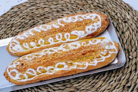 Image of pastries with pastry cream and decorated with white chocolateの写真素材