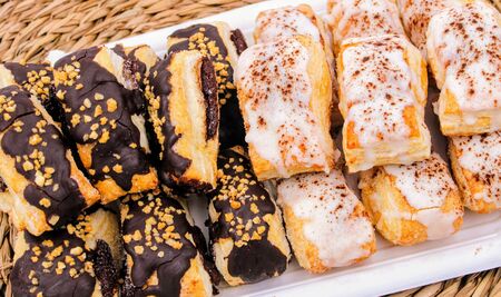 Portion of puff pastry filled with chocolate and pastry creamの写真素材