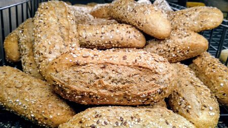 Whole wheat bread freshly baked with seeds and a nice toastの写真素材