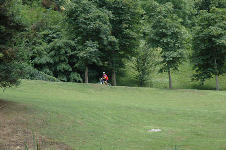 A man cicling in the parkの写真素材