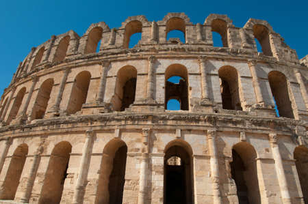 The Roman Colosseum in El Djem is one of the largest Colosseums ever built and the jewel in the crown of the Roman town of Thysdrus which once held decadent villas and dazzling mosaics. In its heyday, 30,000 bloodthirsty people would travel from vast distのeditorial素材