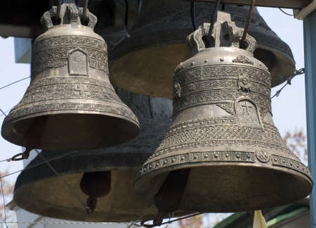 These are bells of Orthodox church-tower  The pattern and religious symbols are seen well on the bell surfaces の写真素材