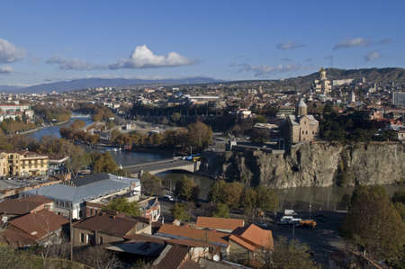 Tbilisi's historical center: Metekhi Church with Sameba Cathedral in the background. The phoro...