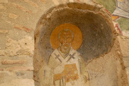 This is an image (fresco) of Saint Nicholas in the St. Nicholas Church, Demre. Saint Nicholas also called Nikolaos of Myra was a historic 4th-century Christian saint and Greek  Bishop of Myra (Demre, part of modern-day Turkey) in Lycia.の写真素材