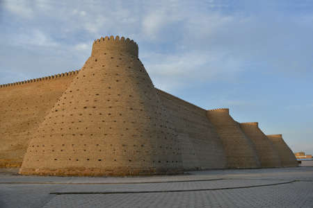 The Ark is a massive fortress located in the city of Bukhara, Uzbekistan. The castle is situated against the blue sky background.のeditorial素材