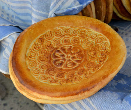This is a close-up of lavash - traditional asian bread. The pattern on lavash is specific for Uzbekistan.の写真素材