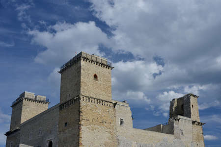 Diosgior stone fortress Hungary against blue sky background. There are different white clouds on the sky.のeditorial素材