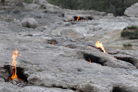 Flaming rock Yanartas in Antalya, Turkey is generally believed to be the ancient Mount Chimera. The wonder-fires have been burning for at least 2500 years.の写真素材