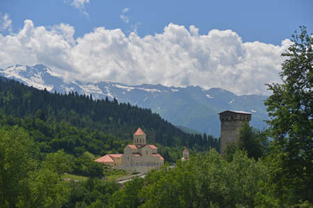Modern shurch and old tower in Mestia (Svaneti region, Georgia).の写真素材