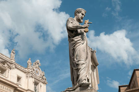 Sculpture of Saint Peter near St. Peter's Basilica Vatican City. Blue sky end clouds are in the background.の写真素材