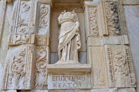 Fragment of woman sculpture on Celsus Library facade ancient Efesus, Turkey.の写真素材