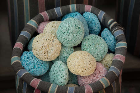 Multicolored pumice in striped sack.  Arab souvenirs.の写真素材