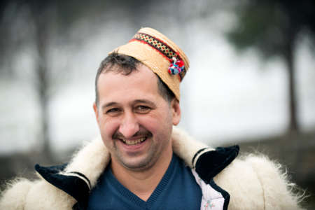 The man in the traditional Romanian (Maramuresh region) clothes. Portrait.のeditorial素材