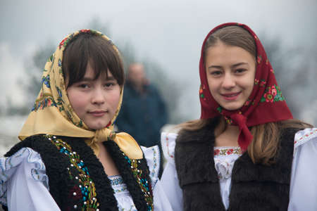 Girls dressed in traditional Romanian clothes (Maramuresh region).のeditorial素材