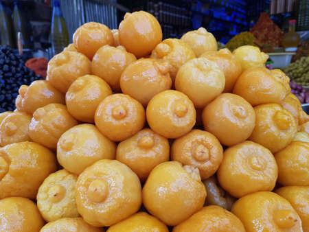Many pickled lemons for sale. The rest of the goods - diversified olives and homemade olive oil are...