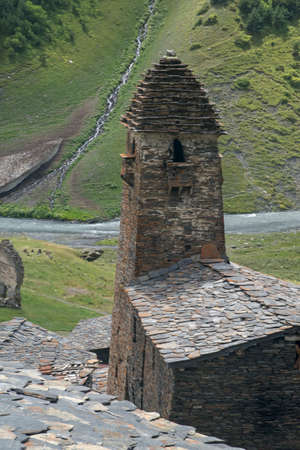 Defensive Tower (Dartlo) against green mountain background. From above it can be seen that all the...