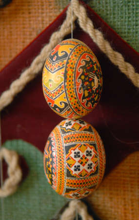 Easter composition - Pysankas (decorated eggs) against carpet background. Kolomyia.