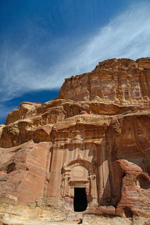 Petra. Carved into the rock tomb. Blue sky in background.のeditorial素材